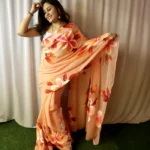 Sunset peach Sunset peach- pink saree